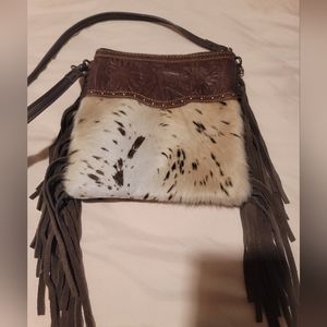 Cowhide fringe purse